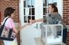 Students enjoy delicious snow cones during an established stress-free zone hosted by Residence Life for finals week.  - Photo by Anne Richoux