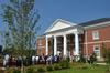 A large crowd gathers outside of the new Hendersonville facility for the building dedication ceremony. - Photo by Morris Abernathy
