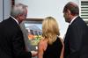 David S. Dockery, president of the university, presents Jim and Janet Ayers, major donors to the project, with a gift during the dedication of the new Hendersonville facility. - Photo by Morris Abernathy