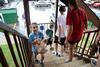 Daniel Ellsworth, son of Tim Ellsworth, assistant vice president for University Communications, helps out during new student move-in day by carrying groceries to a room in the Heritage Complex. - Photo by Jacob Moore