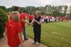 David S. Dockery, president of the university, greets each new student as they arrive at his home for the ice cream social welcoming new students. Over 300 students showed up for the event on the Dockery's lawn. - Photo by Morris Abernathy