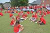 Over 300 new students enjoy an ice cream social on the lawn of David and Lanese Dockery, president and first lady of the university. - Photo by Morris Abernathy