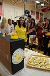Sarah Moore, sophomore Christian studies major, shows new students her LifeGroup table celebrating 'Rubber Duck Day' during the LifeGroup Fair. - Photo by Anne Richoux