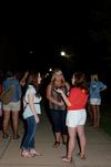 Brittany Thompson (right), junior psychology major, talks with Courtney Burger, freshman pre-med major, and Haley Clay, freshman communications major, during the Howdy Party. - Photo by Anne Richoux