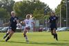 Lady Bulldog Elizabeth Clark keeps the ball away from Melissa Patchin and Melissa Turney of Missouri Baptist during a home soccer game. - Photo by Jacob Moore