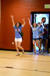 Panhellenic council members and Rho Chis reveal which sorority they are in during Bid Day. - Photo by Anne Richoux