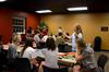Julia Marshall (right), senior special education major, tells students how to make a craft during the residence life Ladies Night in the Bowld Student Commons.  - Photo by Anne Richoux