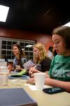 Nicole Bantoz, freshman pre-med major, Alyssa Jordan, freshman music major, and Alexa MacKay, sophomore Christian ministry and missions major, talk while working on crafts at Ladies Night, a residence life event, in the Bowld Student Commons.  - Photo by Anne Richoux