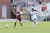 Lady Bulldog Kelsey Gilbert attacks the ball while Belhaven's defender falls behind. - Photo by Ebbie Davis