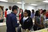 Bill Stewart, senior organizational leadership major, practices a good handshake with Angel Tunstall, freshman psychology major, during the Backpack to Briefcase workshop. - Photo by Jacob Moore