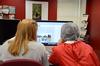 9/11/12 - Students on the Cardinal & Cream staff work on creating a page for the Life section of the student newspaper. - Jacob Moore