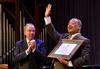 Fred Luter, president of the Southern Baptist Convention and senior pastor of Franklin Avenue Baptist Church, waves and says thank you after his installation as a member of the R.G. Lee Society of Fellows.  In Luter's closing remarks he said " I love Union University and David Dockery, God Bless you". - Photo by Morris Abernathy