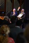 Fred Luter, president of the Southern Baptist Convention, thanks the audience after speaking in chapel. David S. Dockery, president of the university, presented a certificate to Luther celebrating his induction into the R. G. Lee Society of Fellows. - Photo by Jacob Moore