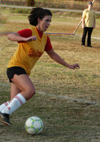 Chi Omega Kerra Kunce drives the ball down field during an intramural soccer game. - Photo by Jonathan Blair