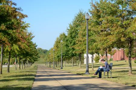 Kaitlyn Pindak, sophomore music major, studies outside on a beautiful, sunny day. 