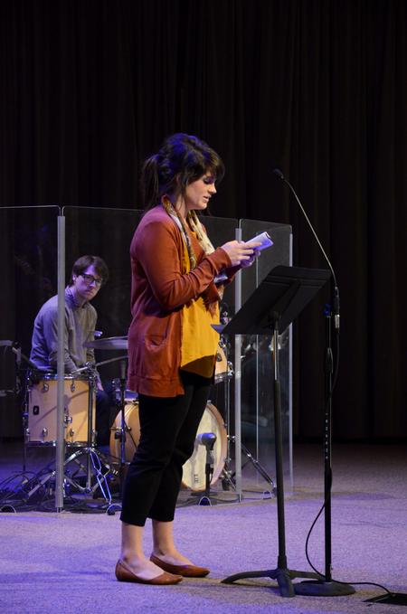 Keely Hart, director of discipleship, reads scripture as part of the final chapel during Faith in Practice week. 