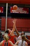 Lady Bulldogs Shelby Ashcraft and Hope Adams Curtis reach for the toss up during a scrimmage game at Bulldog Madness. - Photo by Jacob Moore