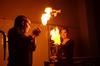 Sam Howard, senior chemistry major, holds a propane gas bubble as Kathy Shelnutt, senior chemistry major, lights it on fire during the Fire and Lights Show. - Photo by Zac Calvert