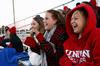Shelby Evans, senior nursing major, Kara Kitchens, senior athletic training major, and Reagan Schrader, freshman accounting major, cheer for the Lady Bulldogs during a home soccer game against Cumberland University.  - Photo by Anne Richoux