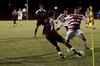 Cody Styx battles for possession of the ball against a Cumberland University player during the last home soccer game of the season.  - Photo by Anne Richoux