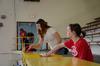 Senior social work majors, Emilie Neal(right) and Natalie Schklar, volunteer at North Side High School as a part of Union's tenth annual Campus and Community Day.  - Photo by Anne Richoux