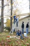 Engineering students work on building a swing set for the East Chester site of Mission Jackson, an outreach program of Englewood Baptist Church, during the tenth annual Campus and Community Day.  - Photo by Anne Richoux