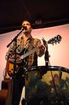 Trenton Wheeler, lead singer of Seryn, performs during a concert at Barefoots Joe. - Photo by Olivia Wallace