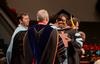 Jacqueline Taylor, doctor of education, receives her diploma from David S. Dockery, president of the university, during Fall Commencement. - Photo by Jacob Moore