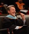 Claude Pressnell, president of the Tennessee Independent Colleges and Universities Association, laughs as David S. Dockery, president of the university, wishes him a happy birthday during Fall Commencement. - Photo by Zac Calvert