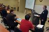 Jim Avery, associate vice president for information technology, gives a presentation to faculty members at the start of the Fall semester.  - Photo by Morris Abernathy