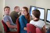 Students get acquainted with the new computers in the DMS lab at the beginning of the Fall 2012 semester. - Photo by Kristi McMurry