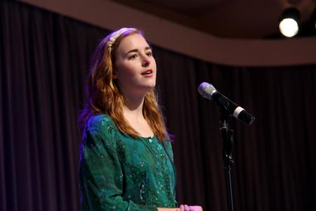 Kelsie Leaf, freshman public relations major, leads music during chapel.