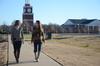 Kristen Wilson, senior elementary education major, and Christin Kelley, senior athletic training major, chat and laugh during a beautiful day on Union's campus.  - Photo by Anne Richoux