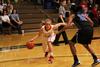 Amy Philamlee dribbles past a Lady Hawks defender for a lay up.  - Photo by Matt McDaniel
