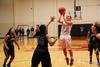 Amy Philamlee shoots over a Lady Hawks defender during the Homecoming game. - Photo by Matt McDaniel