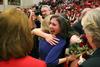 Hannah Strickland hugs Andi Schreiber, 2012 homecoming queen, after being named the 2013 homecoming queen. - Photo by Matt McDaniel
