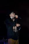 Hip hop artist Dee-1 performs during the Homecoming concert. - Photo by Anne Richoux
