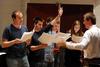 University Singers, Greg Hines, senior music major, and Kenan Keller, sophomore history major, enjoy using different rehearsal techniques under the direction of Chris Mathews, associate professor of music and department chair. - Photo by Anne Richoux