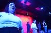 Caitie Vance, sophomore theatre and speech major, performs with fellow actors in Cotton Patch Gospel. - Photo by Olivia Wallace