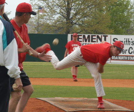 Assistant Coach Brent Fronabarger practices batting with the Bulldogs baseball team. Fronabarger was named AFLAC Assistant Coach of the Year in 2003.