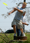 Freshmen Blake Pennington launches his frisbee during a friendly game of frisbee golf on Union's campus. - Photo by Lindsay Stavish