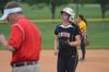 Summer Cross, freshman nursing major, jogs back to first base after a foul ball. - Photo by Matt McDaniel