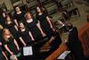 David Dennis, professor of music, directs the women's choir during the Spring Choral Concert at First Baptist Church.  - Photo by Anne Richoux