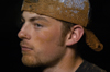 Junior Josh Howerton contemplates the dirtiness that has ensued during the Young Alum's Midnight Mudness. - Photo by Jonathan Blair