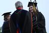 Rachel Carbonell, engineering graduate, accepts the Tigrett Medal from David S. Dockery, president of the university. - Photo by Matt McDaniel