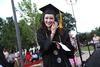 Rachel Carbonell, engineering graduate, returns to her seat after receiving the Tigrett Medal during 2013 Spring Graduation. - Photo by Matt McDaniel