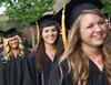 Nursing graduates Morgan Smith, Katherine Smith and Emily Smith walk to the Great Lawn during the Spring Graduation processional. - Photo by Matt McDaniel