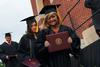 Kendra Sanderson, nursing graduate, smiles after receiving her diploma at Spring Graduation. - Photo by Matt McDaniel