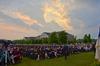 Graduates make their way back to their seats after receiving diplomas at Spring Graduation.  - Photo by Morris Abernathy