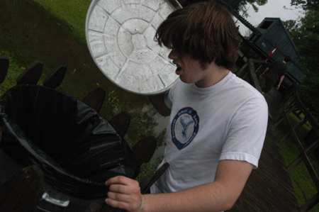Freshman Daniel (Duckie) Drinkard searches for gift
certificates hidden along the route during the Watters Amazing Race.
